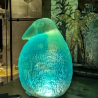 Baby Bird cast in lit translucent blue resin